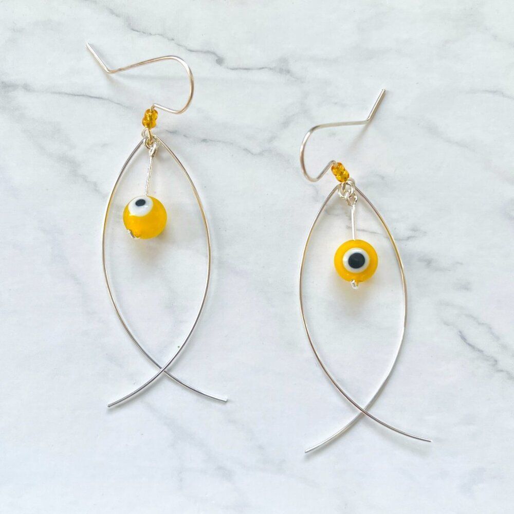 Silver Fish Earrings with Yellow Evil Eye Worry Bead